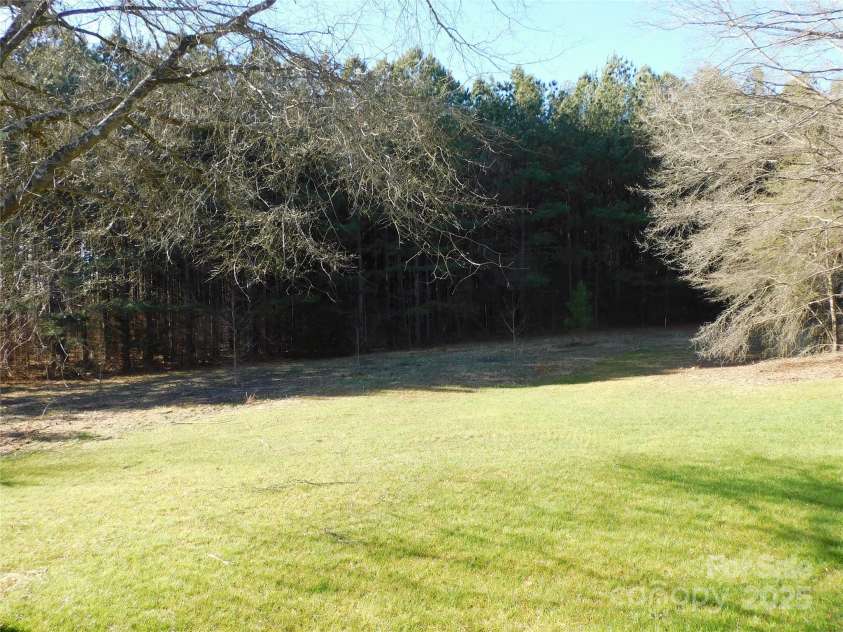 2270 Charlotte Highway, York, SC 29745.  MLS# CAR4202376, YatesRealty ID 3015. Side yard