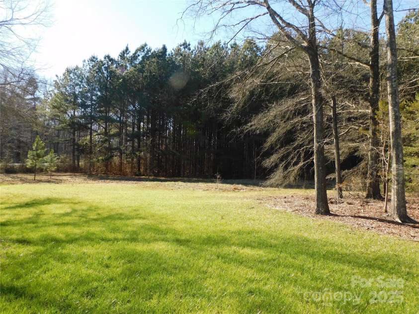 2270 Charlotte Highway, York, SC 29745.  MLS# CAR4202376, YatesRealty ID 3015. Side yard
