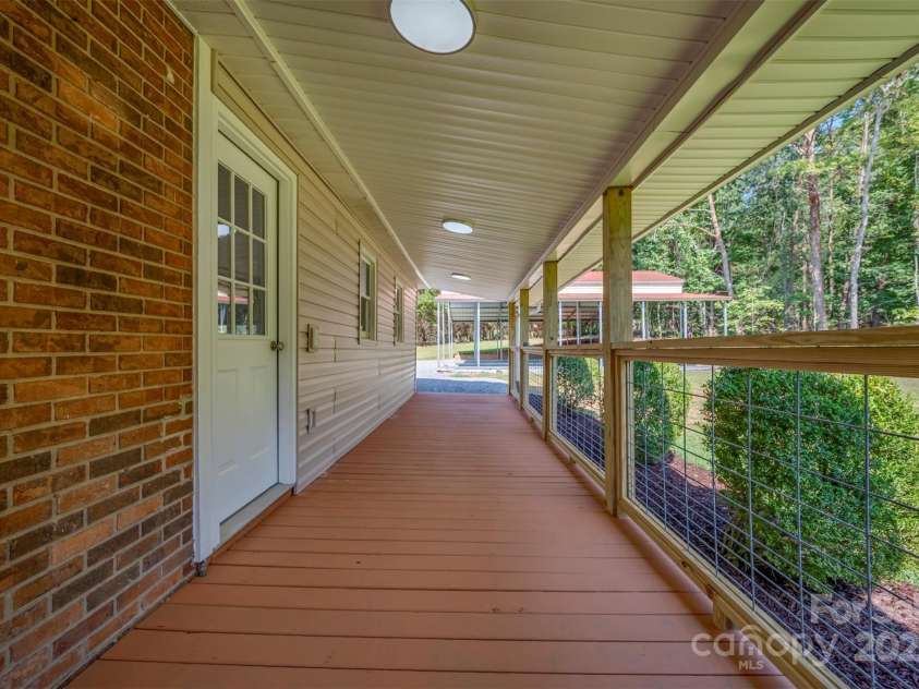 1283 Harris Henrietta Road, Forest City, NC 28043.  MLS# CAR4287411, YatesRealty ID 30152. Covered back porch