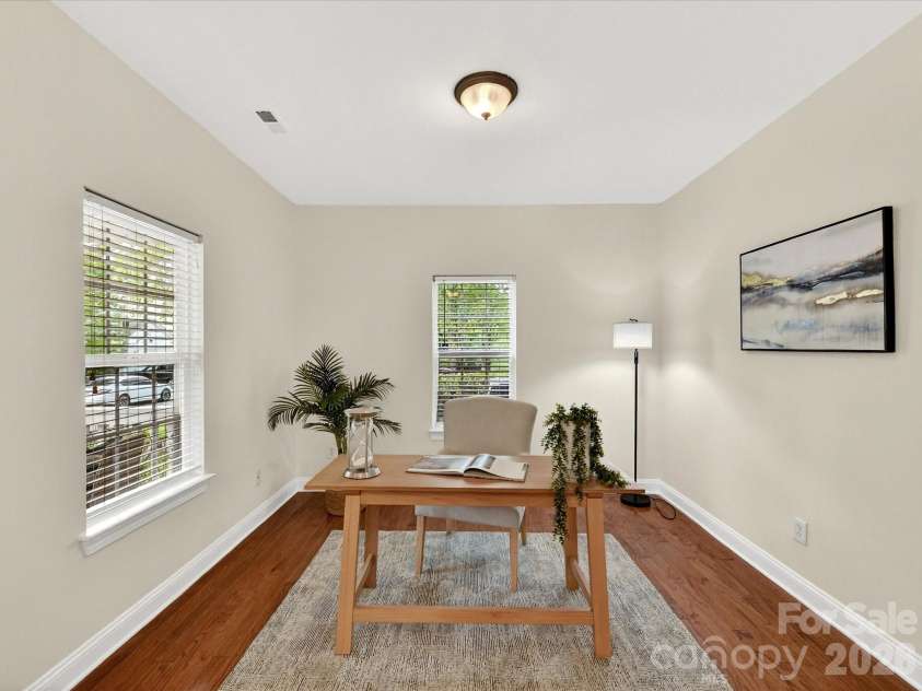 10507 Glenmeade Road, Cornelius, NC 28031.  MLS# CAR4391607, YatesRealty ID 30154. Versatile office or flex space features hardwood flooring, abundant natural light, and ample room for a home office, study, playroom, or additional living area.