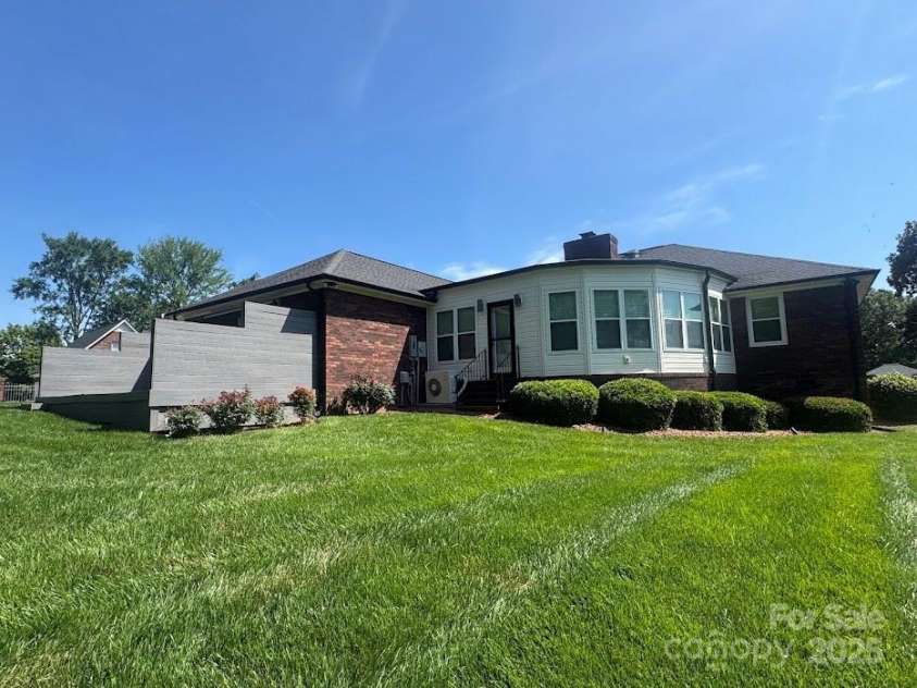 6339 River Front Drive, Harrisburg, NC 28075.  MLS# CAR4301925, YatesRealty ID 30155. Large backyard. Separate deck with awning for privacy outdoors.