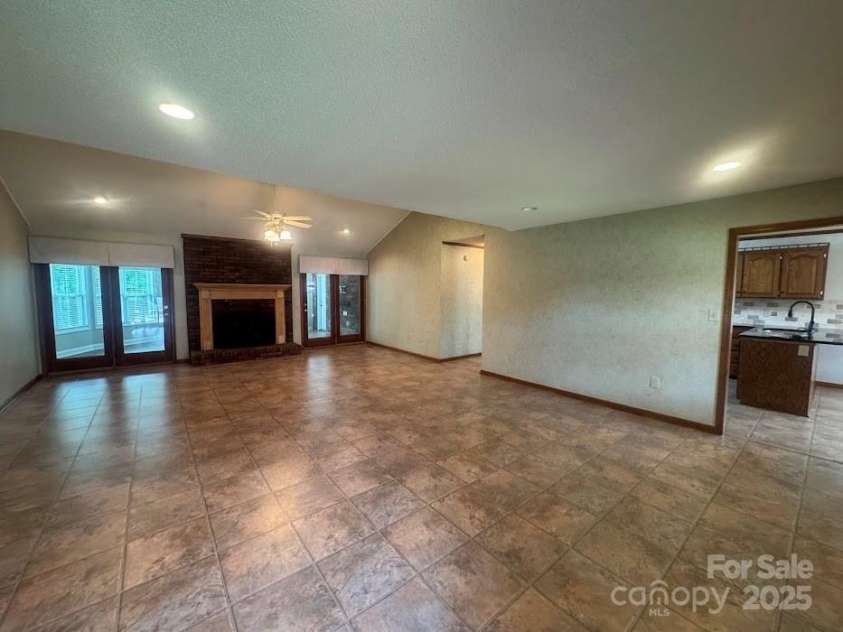 6339 River Front Drive, Harrisburg, NC 28075.  MLS# CAR4301925, YatesRealty ID 30155. Large open dining/great room