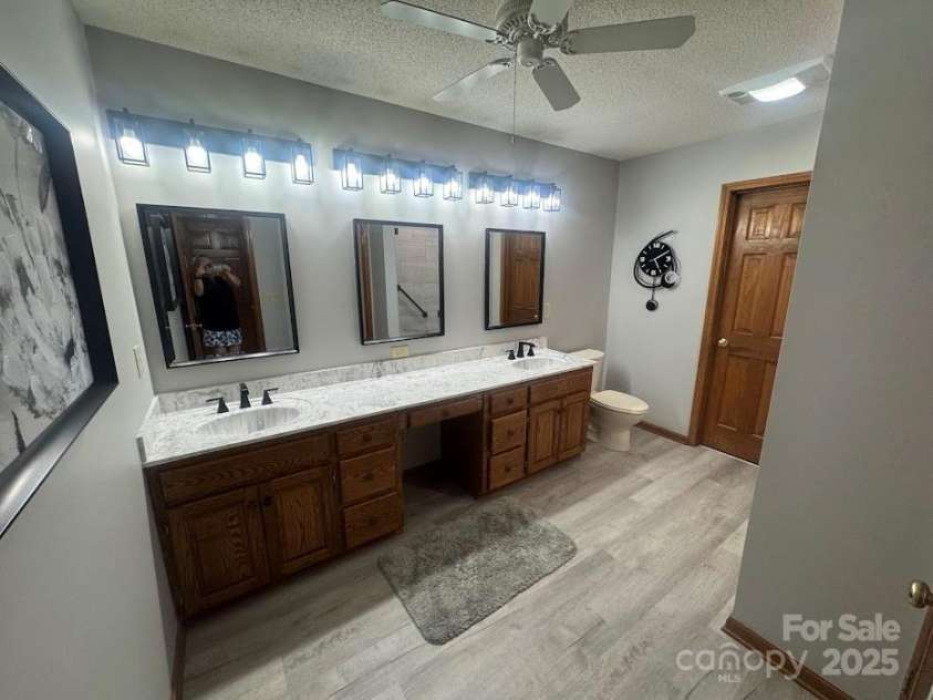6339 River Front Drive, Harrisburg, NC 28075.  MLS# CAR4301925, YatesRealty ID 30155. Large primary bath with long sink and double vanities