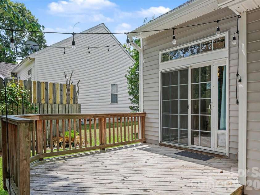 644 Sunset Point Drive, Rock Hill, SC 29732.  MLS# CAR4392650, YatesRealty ID 30156. Direct access to the deck from the dining area