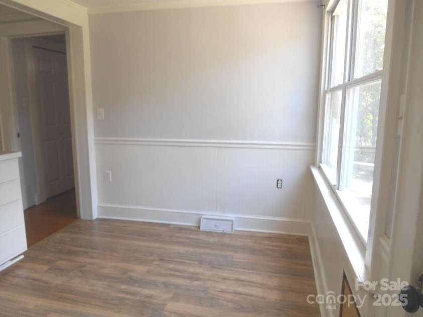 214 H Street, Statesville, NC 28677.  MLS# CAR4282528, YatesRealty ID 30158. Dining/Sunroom Area