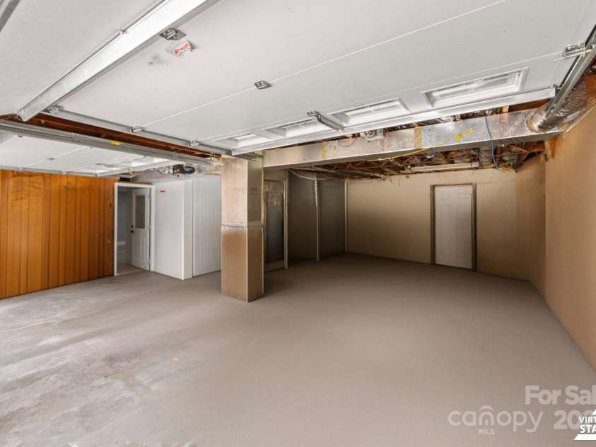 2011 Hampton Heights Street, Lenoir, NC 28645.  MLS# CAR4267552, YatesRealty ID 30159. Attached Garage (Decluttered)