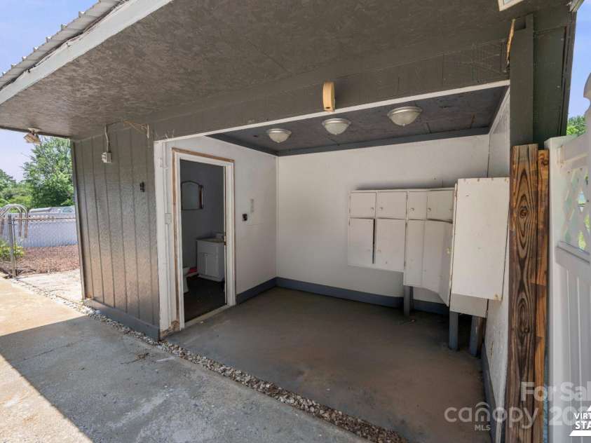 2011 Hampton Heights Street, Lenoir, NC 28645.  MLS# CAR4267552, YatesRealty ID 30159. Pool House (Decluttered)