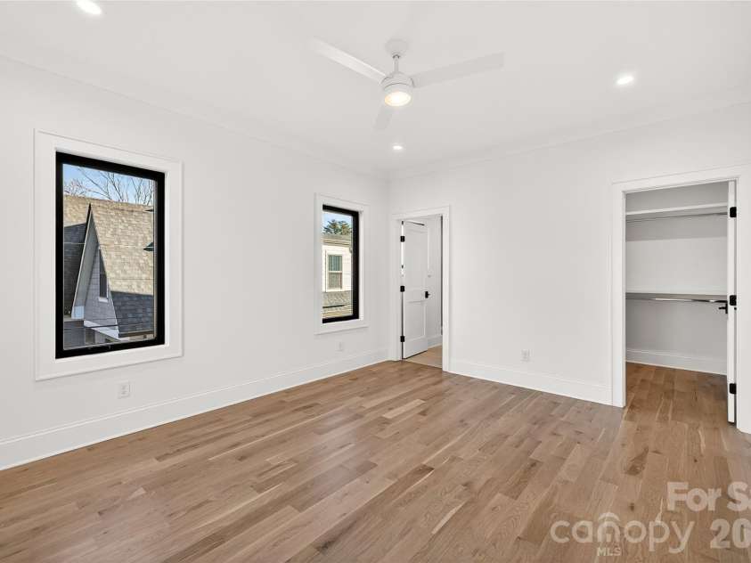 1316 Holmes Drive, Charlotte, NC 28209.  MLS# CAR4338664, YatesRealty ID 3016. 4th Bedroom on Upper Level. Door on left leads to In-suite Bath, door on right is walk-in closet.