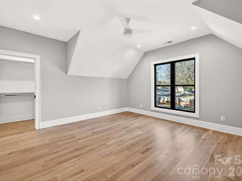 1316 Holmes Drive, Charlotte, NC 28209.  MLS# CAR4338664, YatesRealty ID 3016. Bedroom #3 on Upper Level, front of house. Straight ahead on the left is the in-suite closet. The in-suite bathroom is on the left wall.