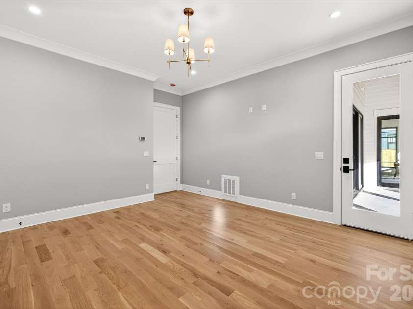 1316 Holmes Drive, Charlotte, NC 28209.  MLS# CAR4338664, YatesRealty ID 3016. Bedroom on Main Level. Door leads to Rear Porch. 