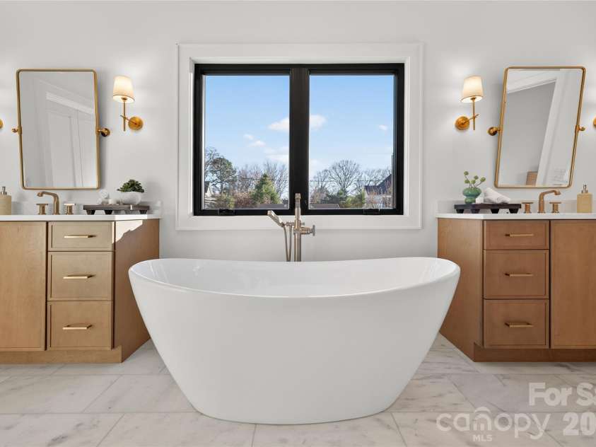 1316 Holmes Drive, Charlotte, NC 28209.  MLS# CAR4338664, YatesRealty ID 3016. Freestanding bathtub in Master Bath. Large and luxurious.
