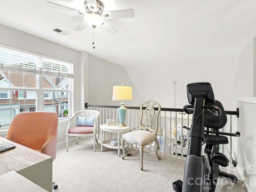 11184 Saintsbury Place, Charlotte, NC 28270.  MLS# CAR4359554, YatesRealty ID 30161. Second story loft/flex space currently used as home office and exercise area.