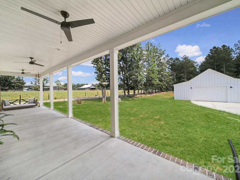 1104 Furnace Road, Iron Station, NC 28080.  MLS# CAR4286754, YatesRealty ID 30162. Back Porch
