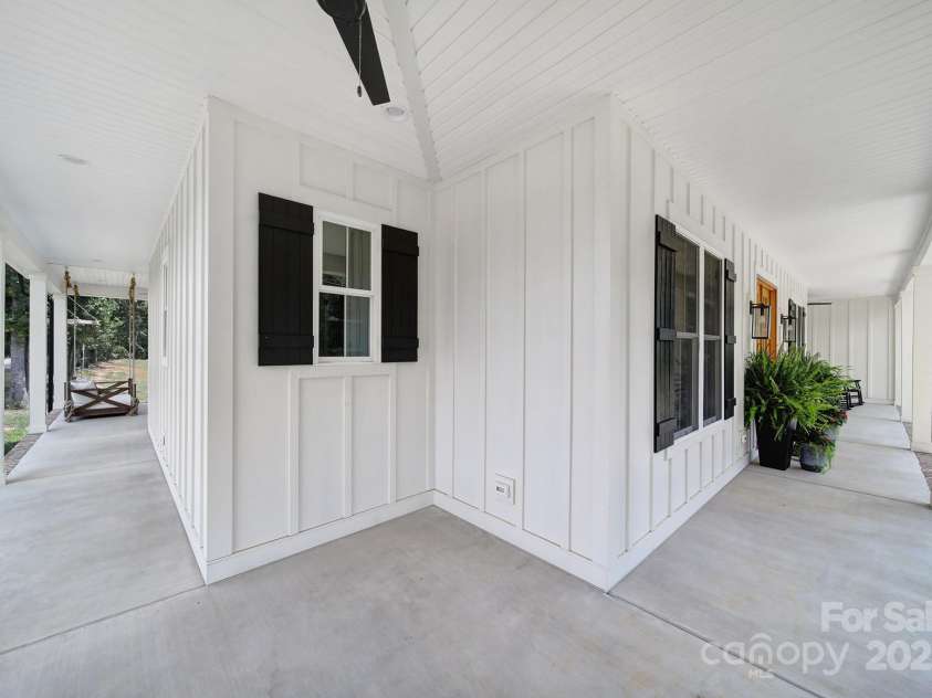 1104 Furnace Road, Iron Station, NC 28080.  MLS# CAR4286754, YatesRealty ID 30162. Wrap-Around Porch