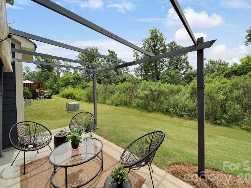 637 Amber Meadows Way, Tega Cay, SC 29708.  MLS# CAR4383765, YatesRealty ID 30162. Back Patio