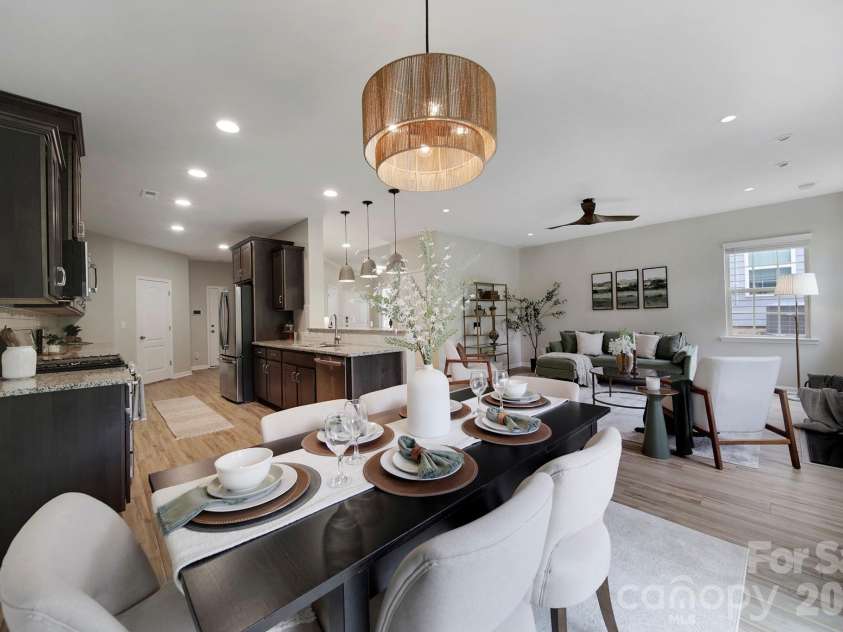 637 Amber Meadows Way, Tega Cay, SC 29708.  MLS# CAR4383765, YatesRealty ID 30162. Dining open to Kitchen and Living