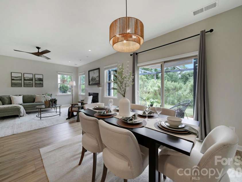 637 Amber Meadows Way, Tega Cay, SC 29708.  MLS# CAR4383765, YatesRealty ID 30162. Dining with Sliding Glass to Patio