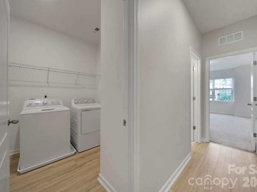 637 Amber Meadows Way, Tega Cay, SC 29708.  MLS# CAR4383765, YatesRealty ID 30162. Laundry Room (upstairs)