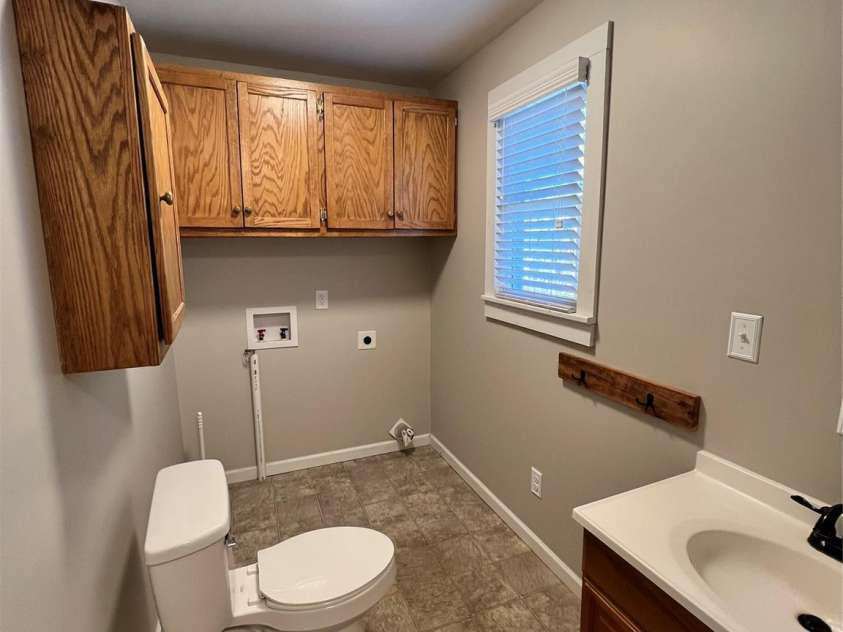 203 Cannon Avenue, Albemarle, NC 28001.  MLS# CAR4341584, YatesRealty ID 3017. Bathroom - Laundry