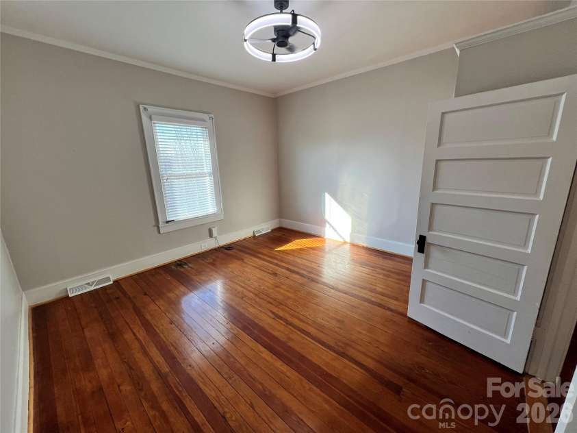 203 Cannon Avenue, Albemarle, NC 28001.  MLS# CAR4341584, YatesRealty ID 3017. Bedroom 1