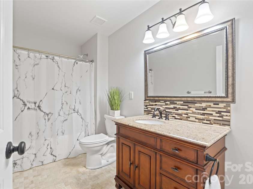 2435 Smith Cove Road, Denver, NC 28037.  MLS# CAR4415106, YatesRealty ID 30170. Upstairs guest bathroom