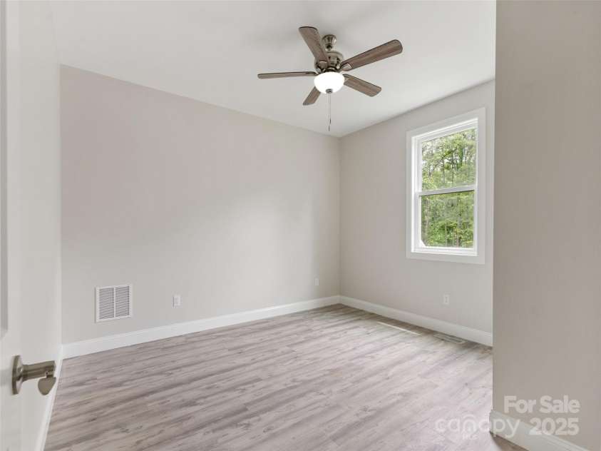 62 Smokey Quartz Lane, Flat Rock, NC 28731.  MLS# CAR4266289, YatesRealty ID 30175. 3rd Bedroom 10'10