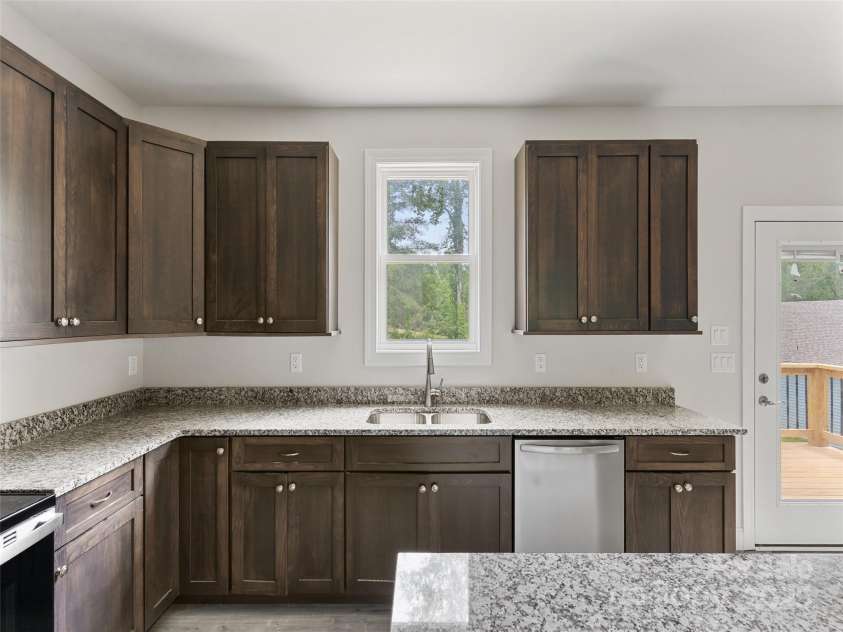 62 Smokey Quartz Lane, Flat Rock, NC 28731.  MLS# CAR4266289, YatesRealty ID 30175. Beautiful cabinetry and granite counters