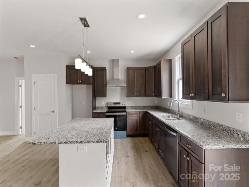 62 Smokey Quartz Lane, Flat Rock, NC 28731.  MLS# CAR4266289, YatesRealty ID 30175. Great space for cooking and entertaining!
