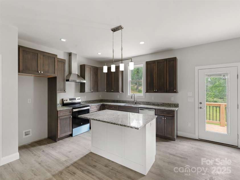 62 Smokey Quartz Lane, Flat Rock, NC 28731.  MLS# CAR4266289, YatesRealty ID 30175. Kitchen with breakfast bar