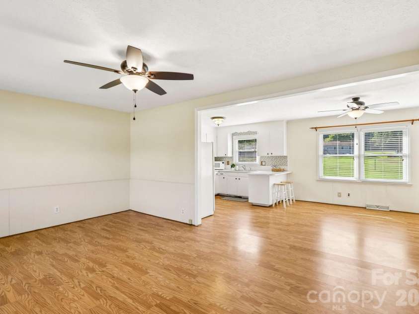 5111 Hawthorne Lane, Shelby, NC 28152.  MLS# CAR4422090, YatesRealty ID 30178. Inviting and open living room