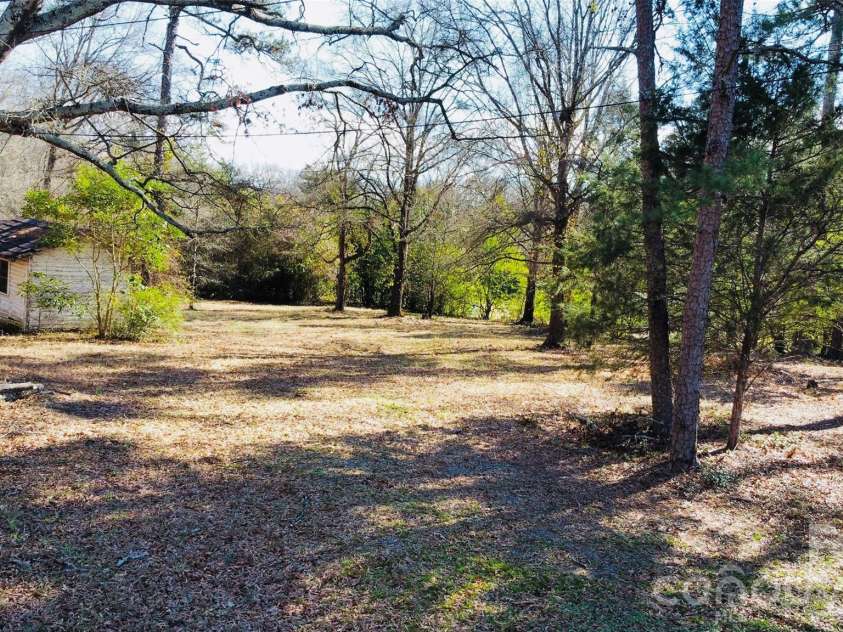 113 Stonecrest Circle, Concord, NC 28027.  MLS# CAR4337560, YatesRealty ID 3019. Side and back view