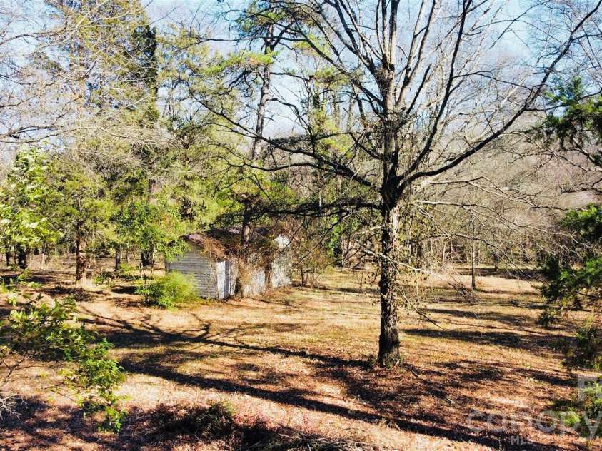 113 Stonecrest Circle, Concord, NC 28027.  MLS# CAR4337560, YatesRealty ID 3019. Side and back view