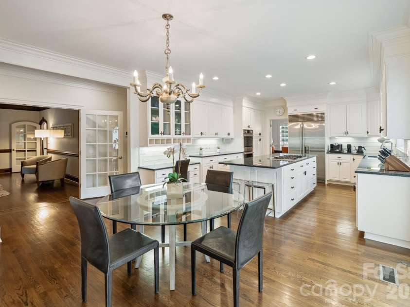 8124 Greencastle Drive, Charlotte, NC 28210.  MLS# CAR4364842, YatesRealty ID 30191. Breakfast area and kitchen.