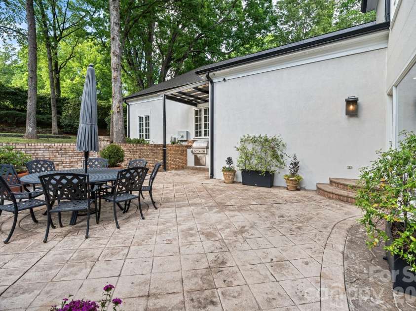 8124 Greencastle Drive, Charlotte, NC 28210.  MLS# CAR4364842, YatesRealty ID 30191. Outdoor dining patio.