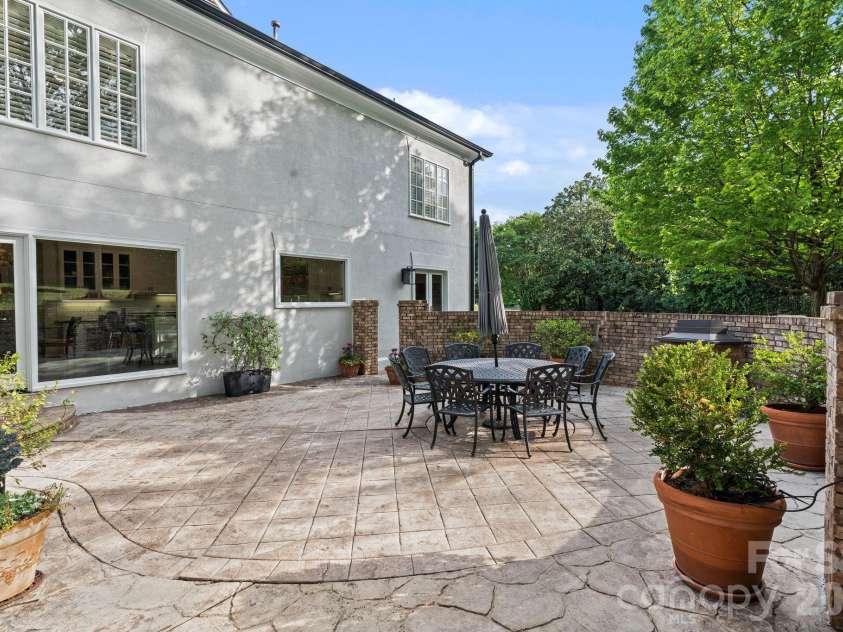 8124 Greencastle Drive, Charlotte, NC 28210.  MLS# CAR4364842, YatesRealty ID 30191. Outdoor dining patio.