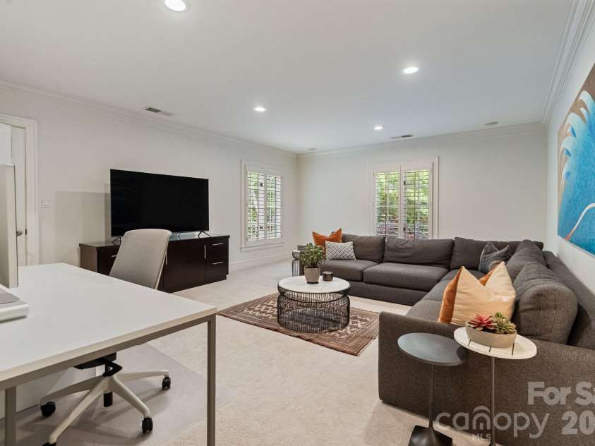 8124 Greencastle Drive, Charlotte, NC 28210.  MLS# CAR4364842, YatesRealty ID 30191. Upper level guest bedroom 4/bonus room.