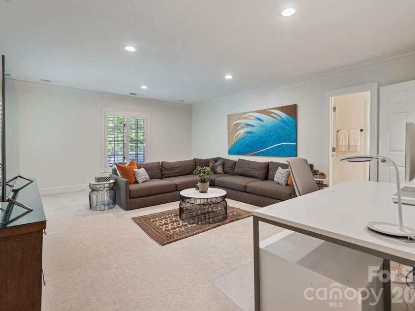 8124 Greencastle Drive, Charlotte, NC 28210.  MLS# CAR4364842, YatesRealty ID 30191. Upper level guest bedroom 4/bonus room.