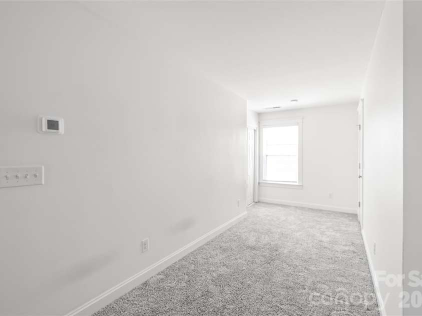 11543 Ardrey Crest Drive, Charlotte, NC 28277.  MLS# CAR4380693, YatesRealty ID 30194. The third level maximizes every square inch, boasting both a dedicated closet and a second walk-in attic space.