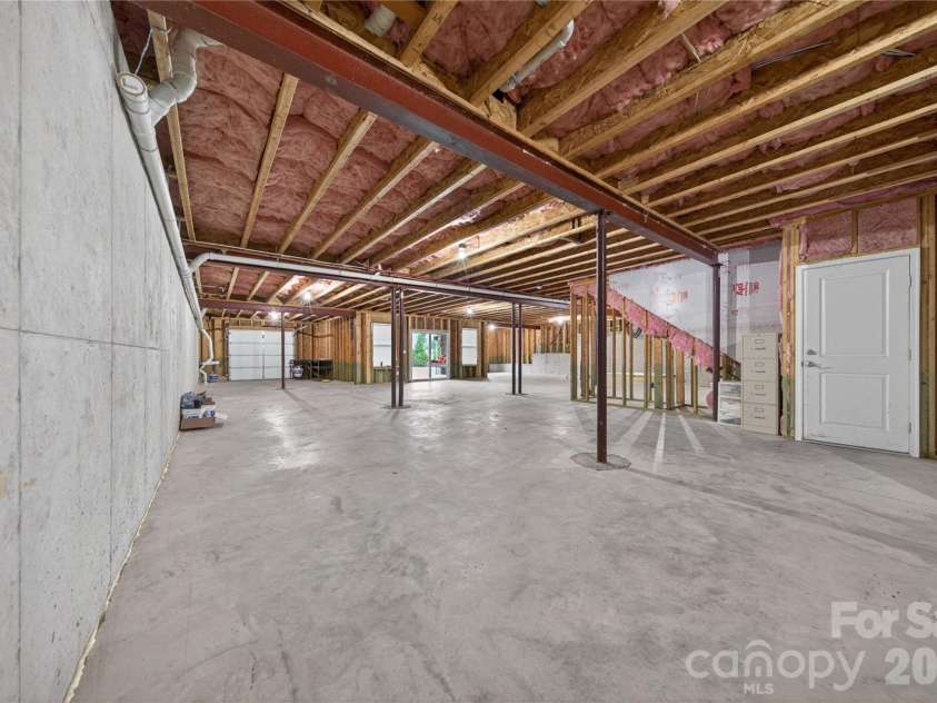 6044 Candlestick Lane, Lancaster, SC 29720.  MLS# CAR4385594, YatesRealty ID 30198. Rough Plumbed Basement with Garage Bay