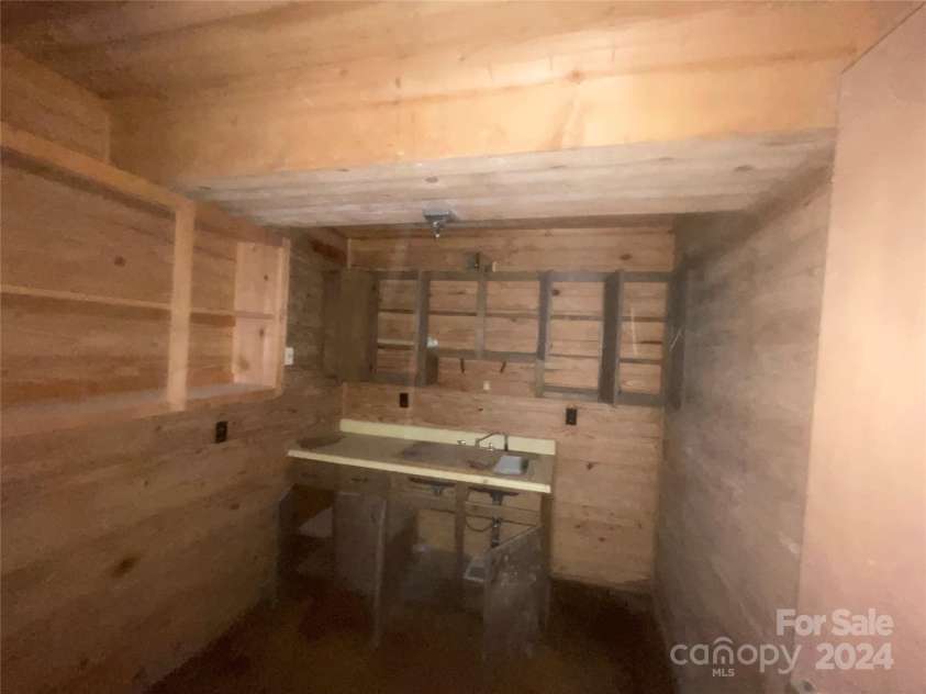 152 Long Branch Road, Chesnee, SC 29323.  MLS# CAR4204540, YatesRealty ID 302. Another room in the basement. Maybe this was a kitchen at one time?