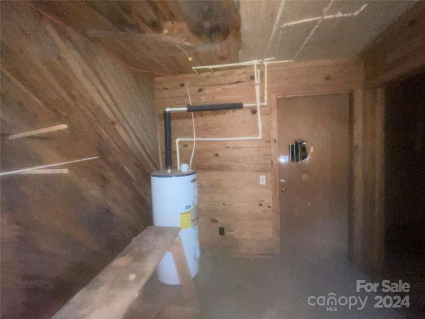 152 Long Branch Road, Chesnee, SC 29323.  MLS# CAR4204540, YatesRealty ID 302. Basement area appears to have held a third apartment, remnants of the laundry hookup are also down here.