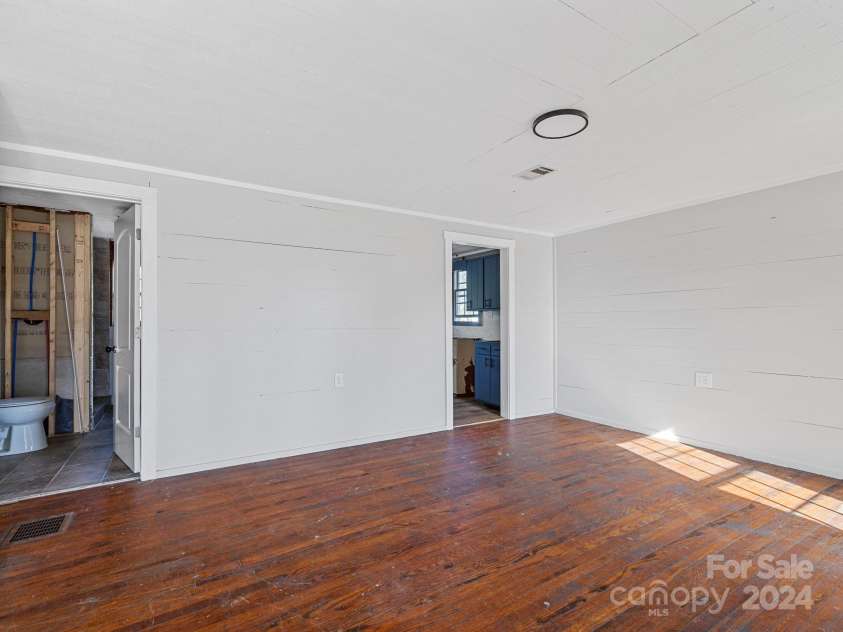 152 Long Branch Road, Chesnee, SC 29323.  MLS# CAR4204540, YatesRealty ID 302. Bathroom and kitchen are off the main living room.