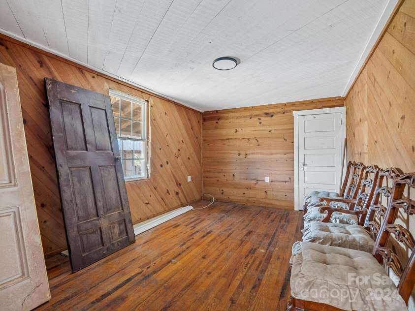 152 Long Branch Road, Chesnee, SC 29323.  MLS# CAR4204540, YatesRealty ID 302. Beautiful front room with lovely wood walls, ceiling and floors.  