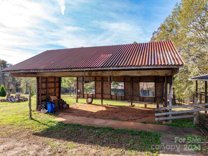 152 Long Branch Road, Chesnee, SC 29323.  MLS# CAR4204540, YatesRealty ID 302. Large carport has endless uses!