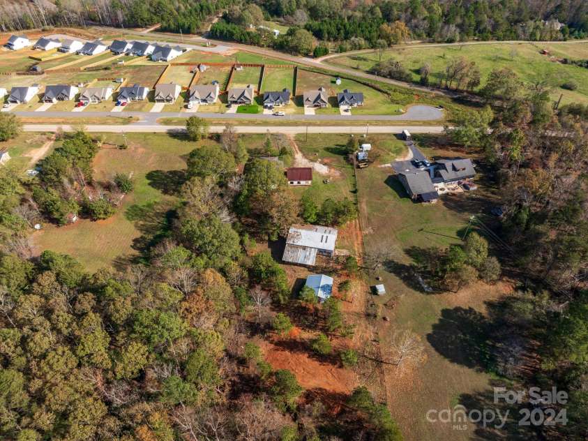 152 Long Branch Road, Chesnee, SC 29323.  MLS# CAR4204540, YatesRealty ID 302. Newer subdivision across the street with public water.