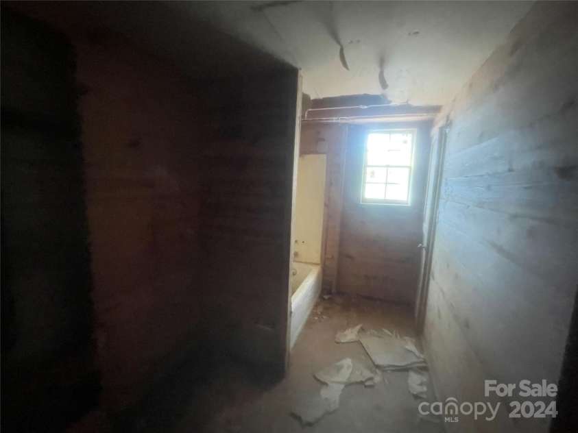 152 Long Branch Road, Chesnee, SC 29323.  MLS# CAR4204540, YatesRealty ID 302. Scary basement full bath space BUT you could have three full baths with some labor and $$$.