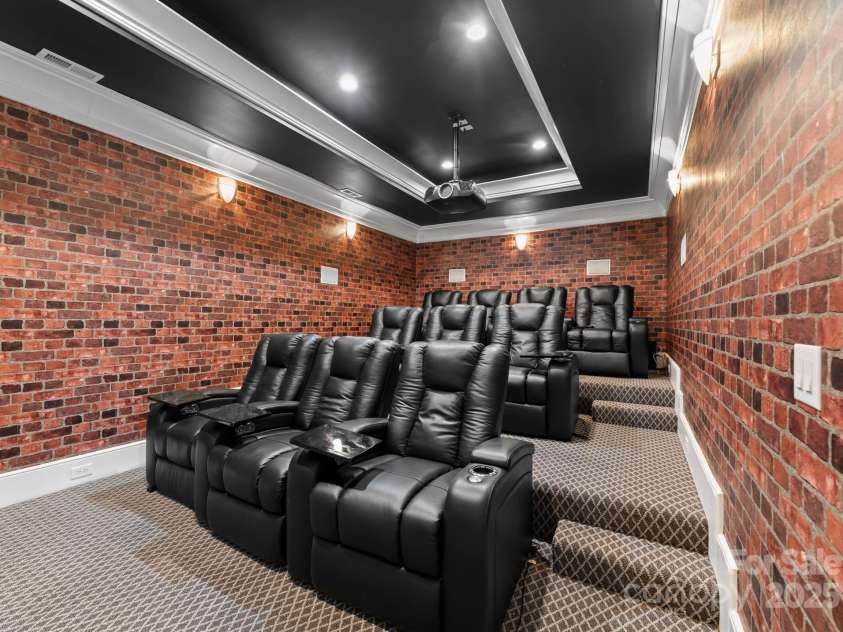16921 Jetton Road, Cornelius, NC 28031.  MLS# CAR4191237, YatesRealty ID 302. 10 seat theater room. Chairs and theater equipment included.