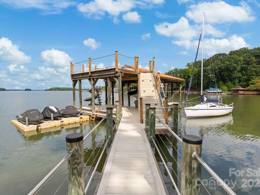 16921 Jetton Road, Cornelius, NC 28031.  MLS# CAR4191237, YatesRealty ID 302. Double level covered dock with 10,000 lb boat lift