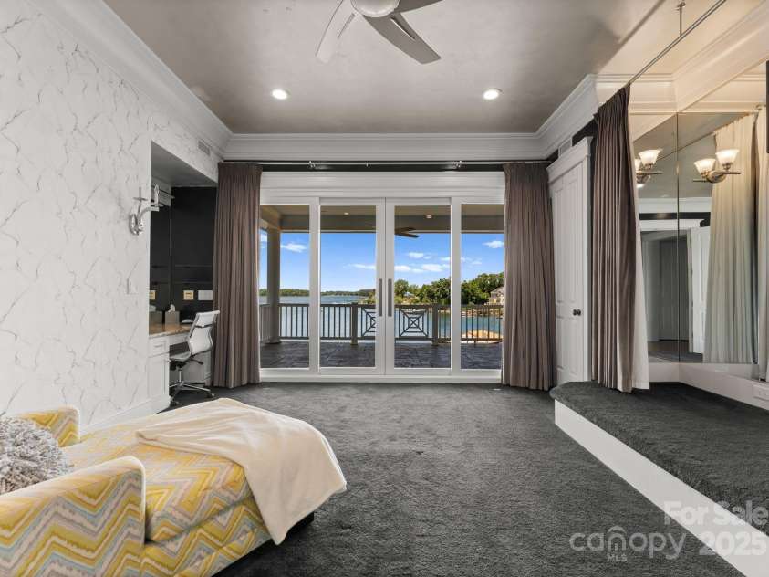 16921 Jetton Road, Cornelius, NC 28031.  MLS# CAR4191237, YatesRealty ID 302. Guest bedroom 2  with access to covered porch