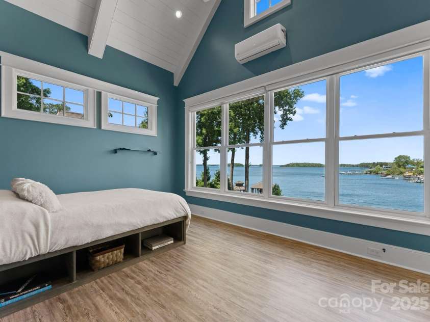 16921 Jetton Road, Cornelius, NC 28031.  MLS# CAR4191237, YatesRealty ID 302. Guest bedroom with access to covered porch